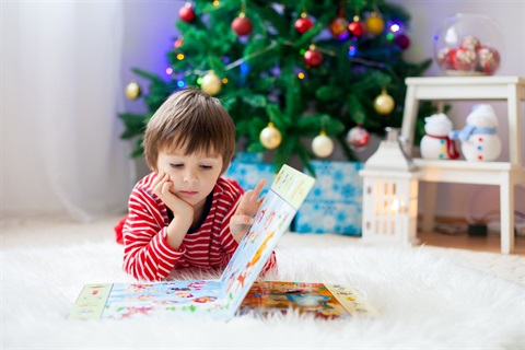 xmas boy read shutterstock_1220145112.jpg